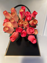 Load image into Gallery viewer, 2 Dozen Wooden Roses in a Black Purse. Restock Coming Soon.
