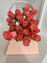 Load image into Gallery viewer, 2 Dozen Wooden Roses in a Pink Purse. Restock Coming Soon.