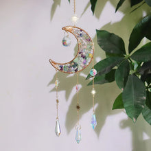 Load image into Gallery viewer, Decorative hanging moon-shaped ornament with crystals against a light background
